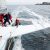 Des participants heureux naviguent à bord du trimaran 60 pieds Sensations